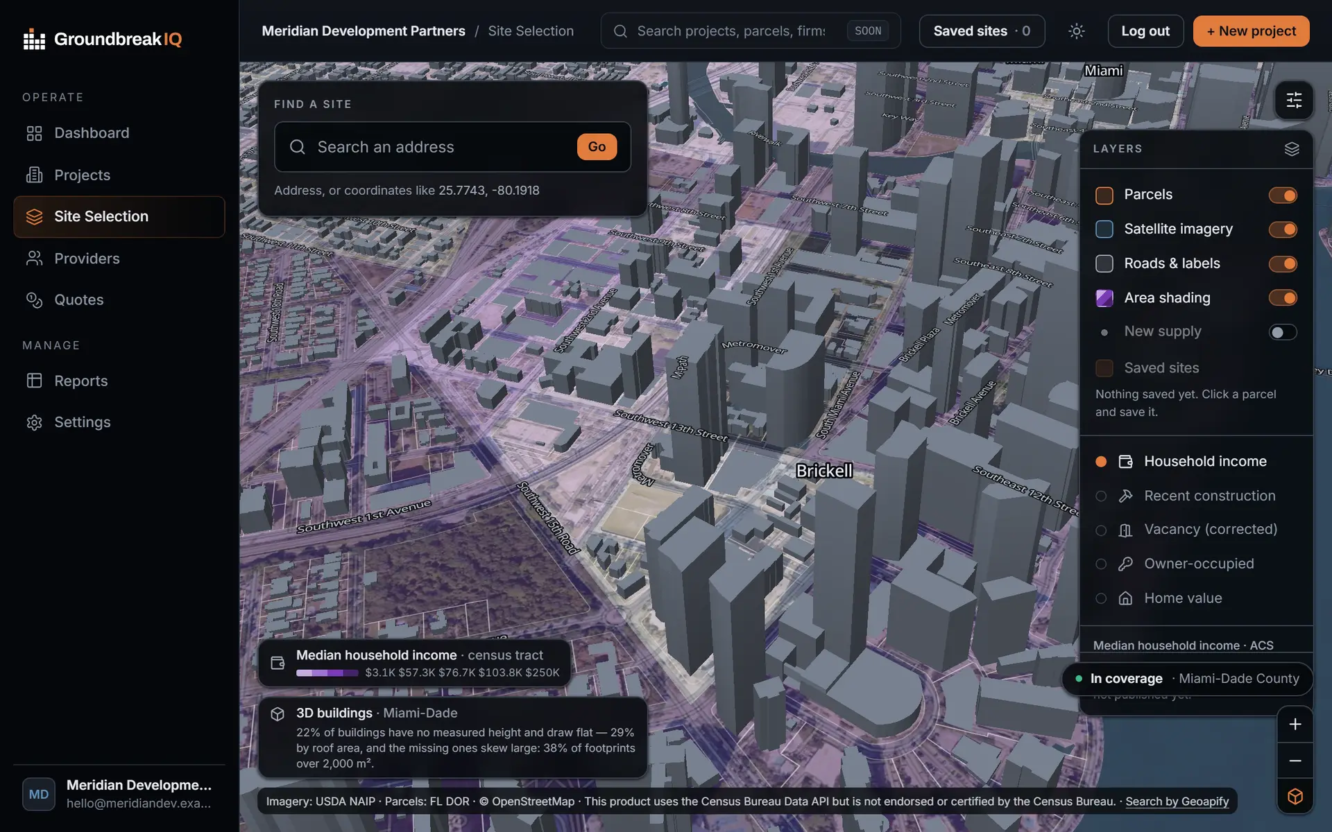 The Groundbreak IQ site-selection map: 3D buildings over Brickell standing on a census-tract income choropleth, with white dots marking parcels holding issued permits for new multi-unit housing.